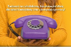 Na żółtym tle telefon stacjonarny