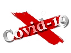 dwa znaki po farbie z napisem COVID 19