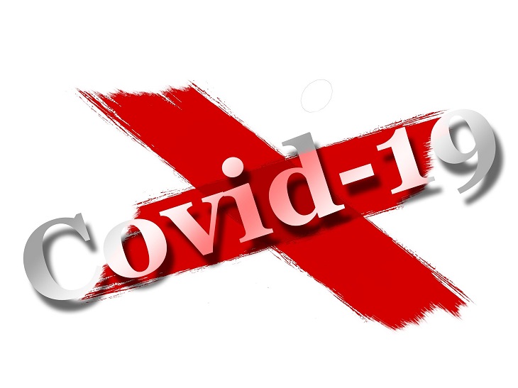 dwa znaki po farbie z napisem COVID 19