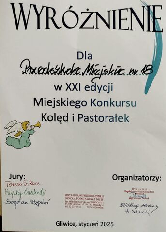 Zdjęcie niniejsze przedstawia dyplom za udział w konkursie ogólnomiejskim i zajęcie wyróżnienia